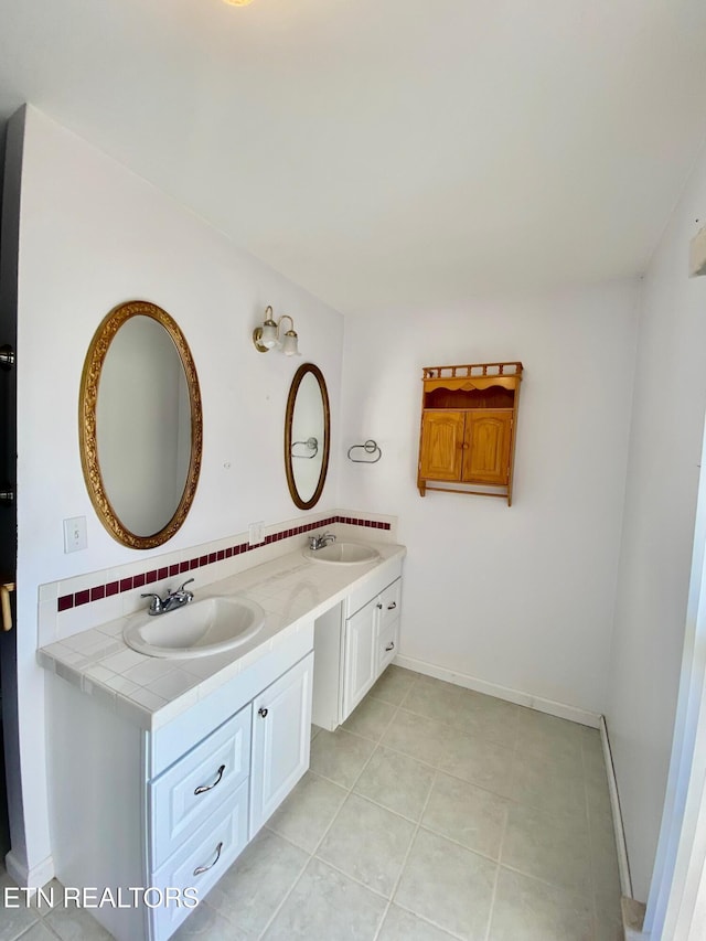 bathroom featuring vanity and tile patterned floors