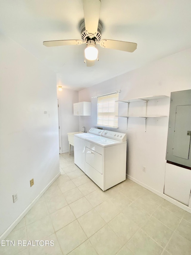 laundry room featuring ceiling fan, washing machine and clothes dryer, electric panel, and light tile patterned flooring