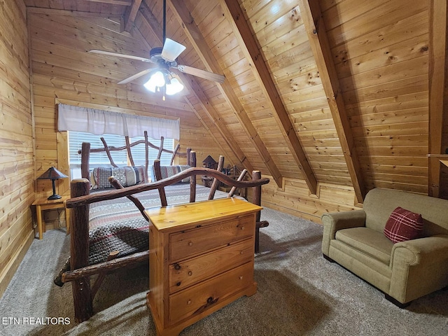 sitting room featuring wood ceiling, lofted ceiling with beams, dark colored carpet, and wood walls