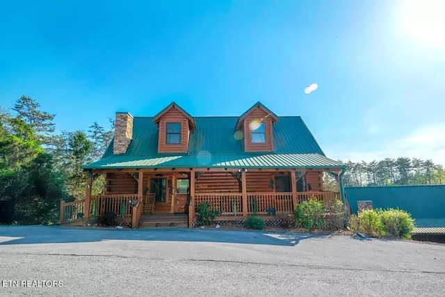 log home with a porch