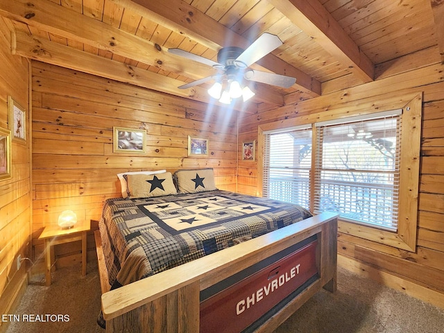 bedroom with wooden walls and beamed ceiling