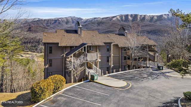 exterior space featuring a mountain view