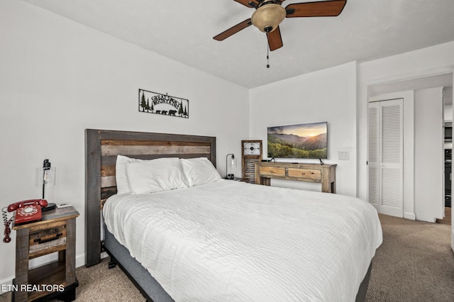 bedroom with ceiling fan and carpet floors