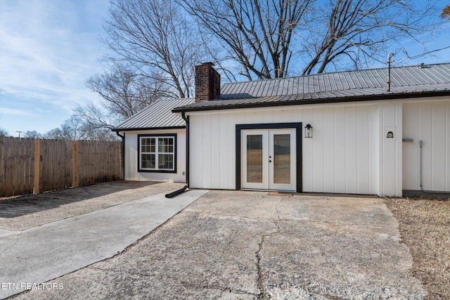 back of house featuring french doors and a patio