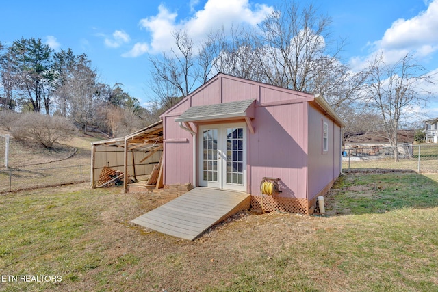 view of outdoor structure featuring a yard