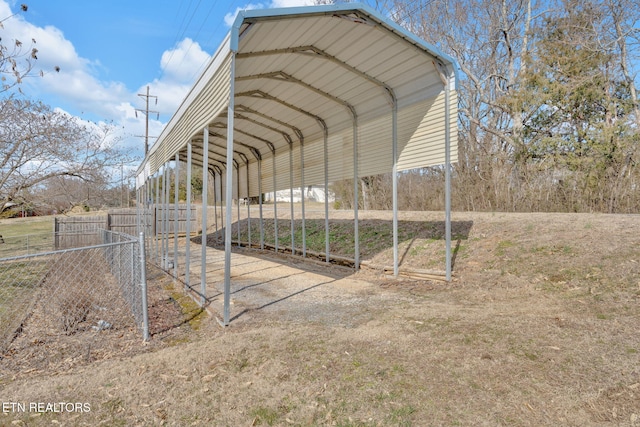 view of outbuilding featuring a carport