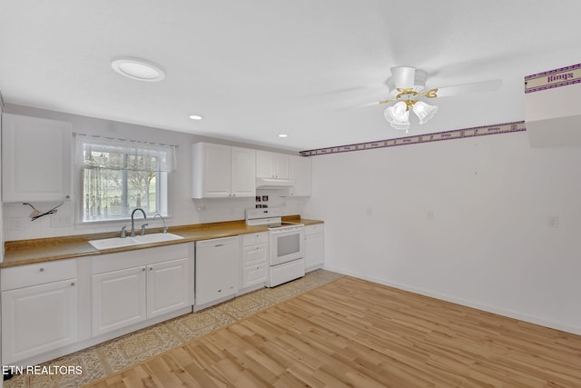 kitchen featuring sink, white cabinets, decorative backsplash, white appliances, and light hardwood / wood-style flooring