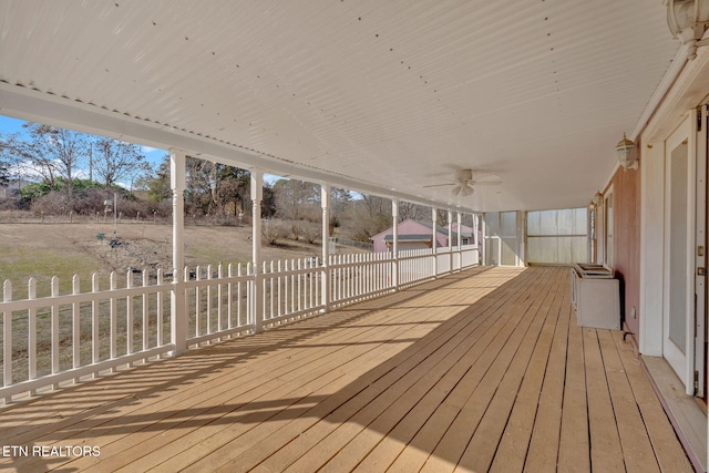 wooden deck with ceiling fan