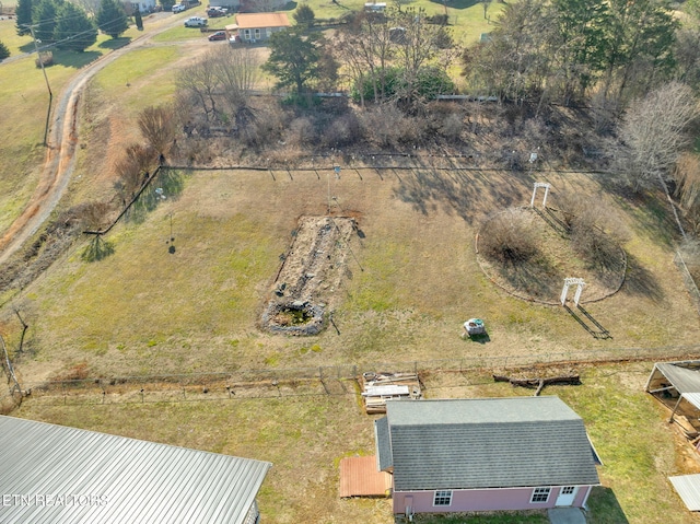 birds eye view of property featuring a rural view