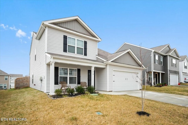 view of front of house with a garage, a porch, and a front lawn