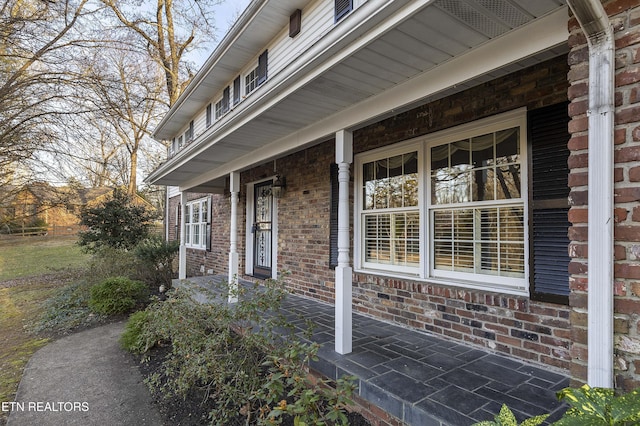 entrance to property with covered porch