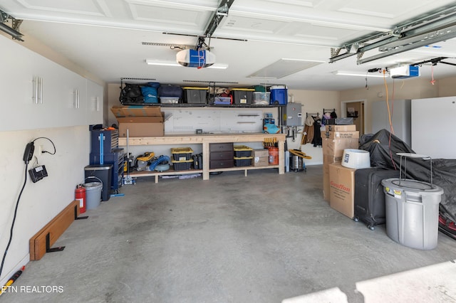 garage featuring a garage door opener