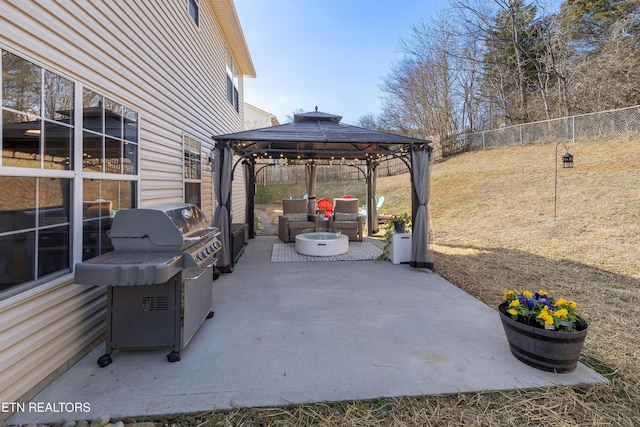 view of patio featuring area for grilling and a gazebo