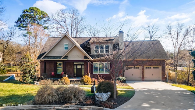 craftsman-style home with a garage