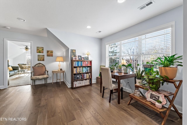 office with hardwood / wood-style flooring