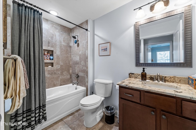 full bathroom with vanity, shower / bath combination with curtain, tile patterned floors, and toilet