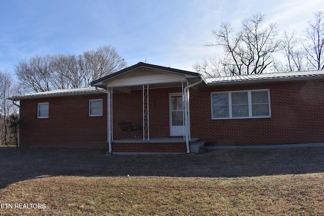 exterior space with a yard