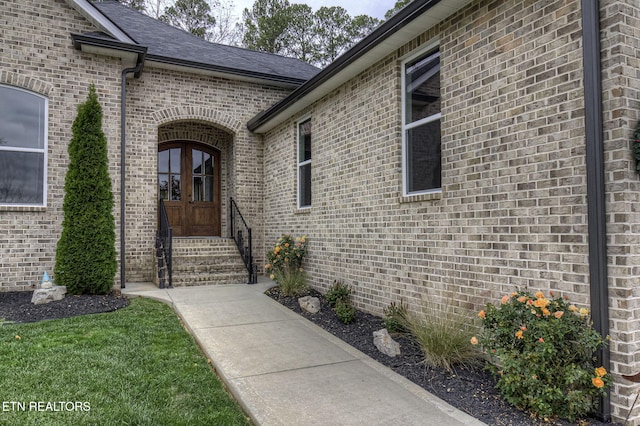 property entrance featuring french doors