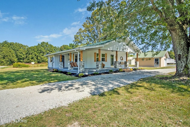 view of front of property with a front lawn and a porch