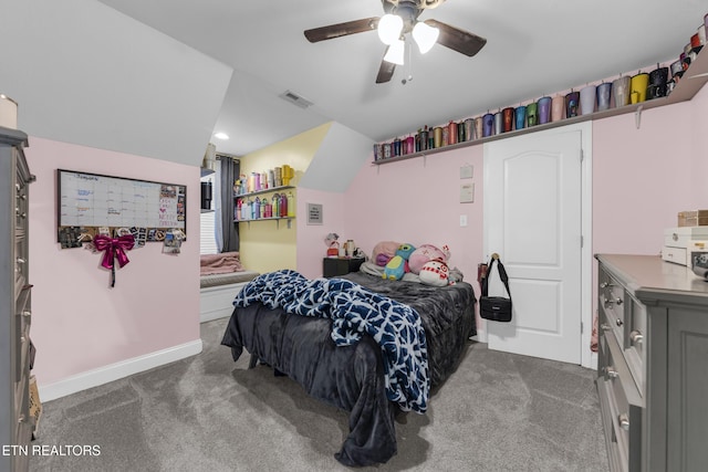 carpeted bedroom with lofted ceiling and ceiling fan