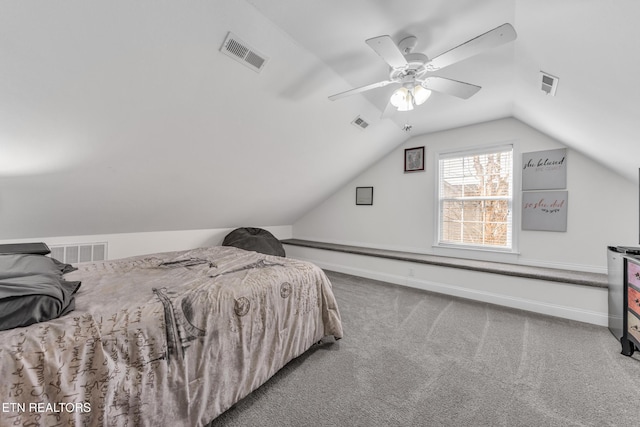 bedroom with ceiling fan, vaulted ceiling, and carpet