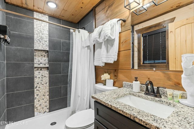 bathroom featuring a shower with curtain, vanity, toilet, and wood walls