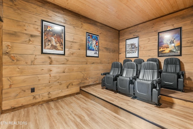 home theater featuring hardwood / wood-style flooring and wooden ceiling