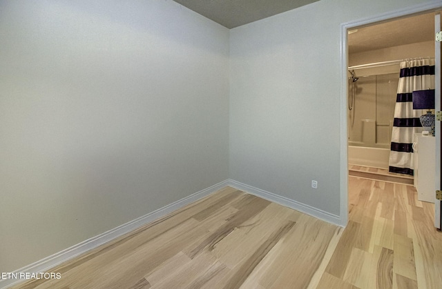 unfurnished room featuring light hardwood / wood-style flooring