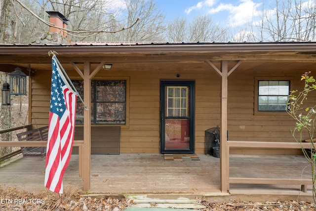 property entrance with a porch