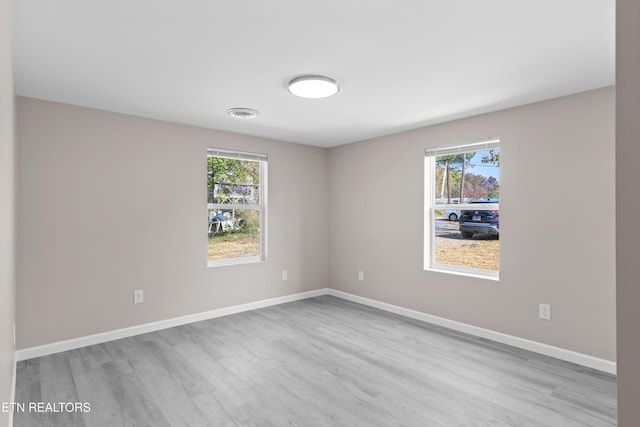 empty room featuring light hardwood / wood-style floors