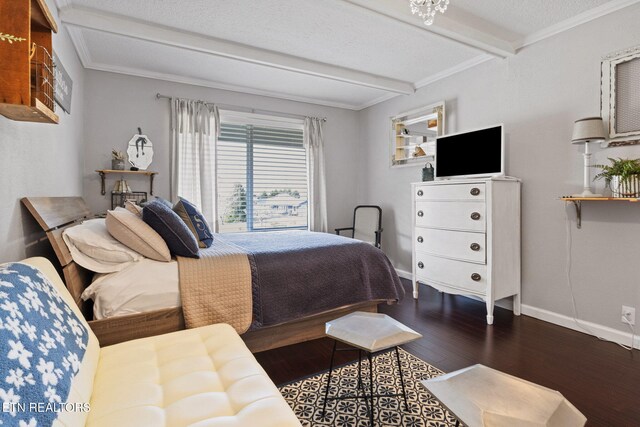 bedroom featuring beamed ceiling, ornamental molding, dark hardwood / wood-style flooring, and a textured ceiling