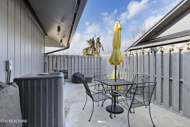 view of patio featuring central AC