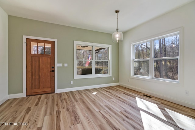 foyer featuring light wood-type flooring