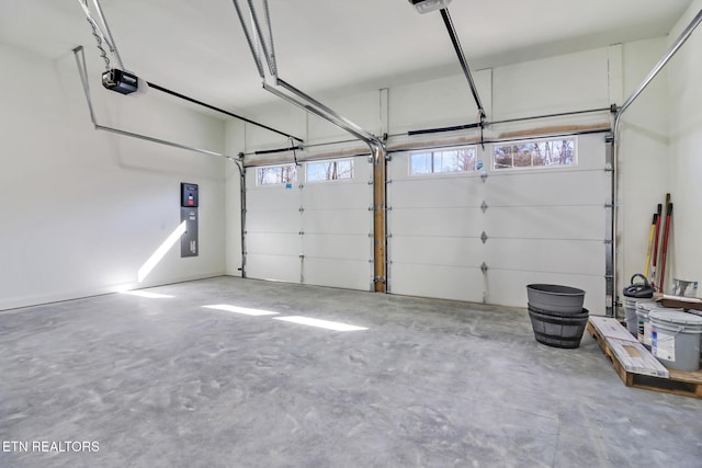 garage featuring a garage door opener