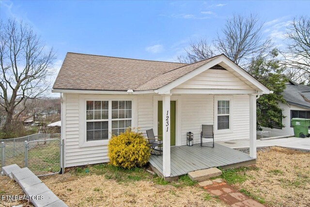 1231 Jefferson Ave, Maryville, TN 37804 - back of property featuring a gate, fence, and roof with shingles