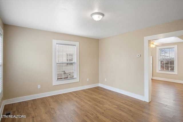 1231 Jefferson Ave, Maryville, TN 37804 - empty room featuring visible vents, baseboards, and wood finished floors