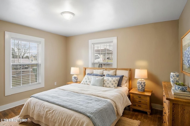 1231 Jefferson Ave, Maryville, TN 37804 - bedroom featuring dark wood-type flooring, multiple windows, and baseboards