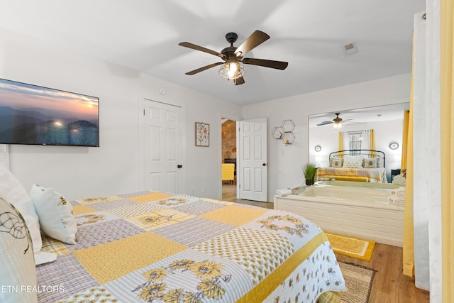 bedroom featuring ceiling fan and light hardwood / wood-style floors