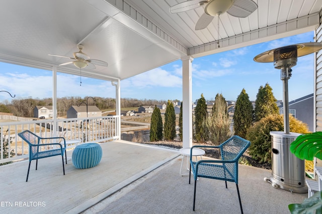 view of patio featuring ceiling fan