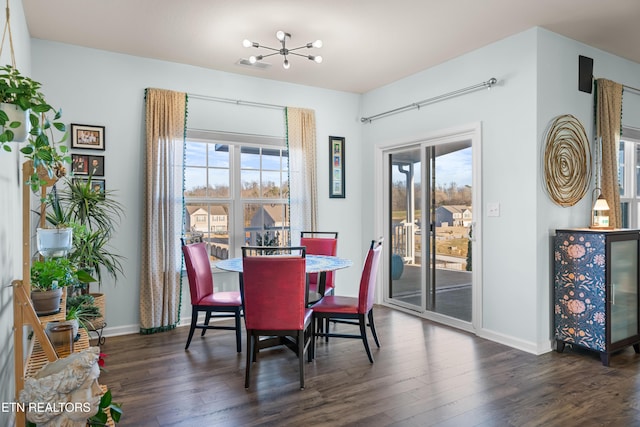 dining space with dark wood-type flooring