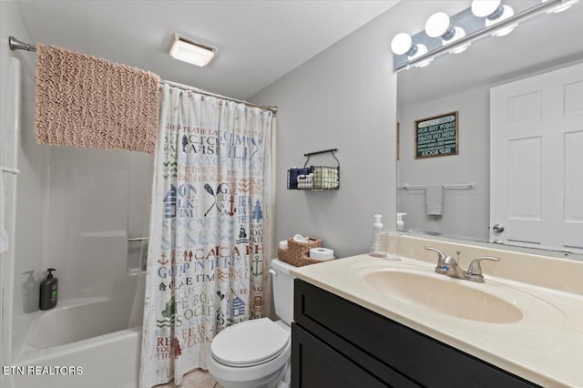 full bathroom featuring vanity, shower / tub combo, and toilet