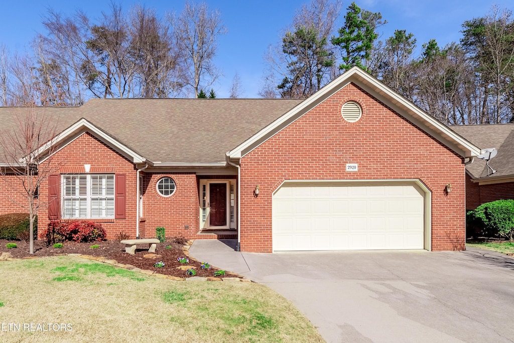 single story home with a garage