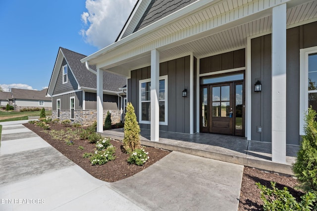 doorway to property with covered porch