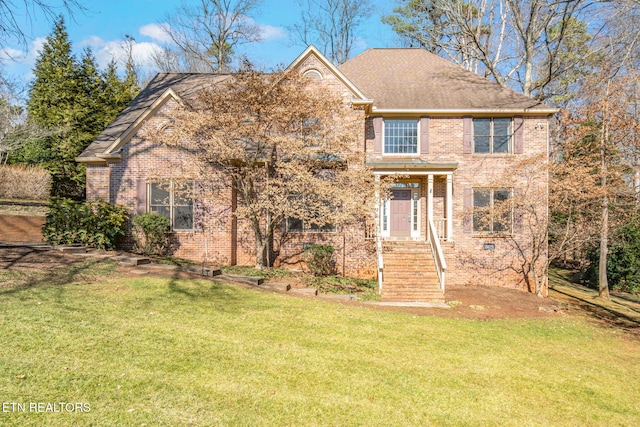 view of front facade with a front yard