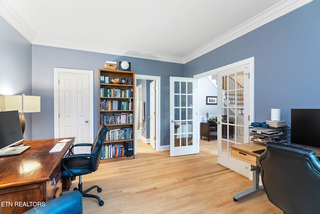 office area featuring french doors, ornamental molding, and light hardwood / wood-style floors