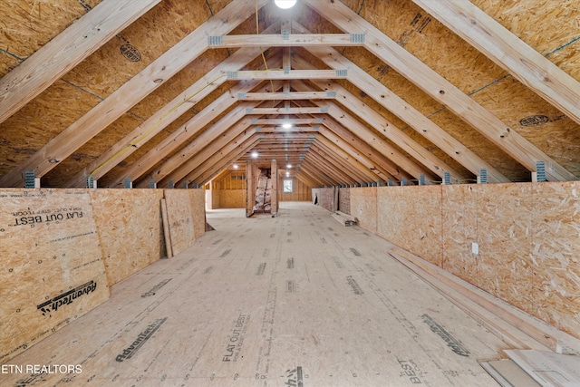 view of unfinished attic