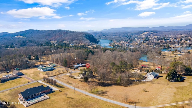 bird's eye view featuring a water and mountain view