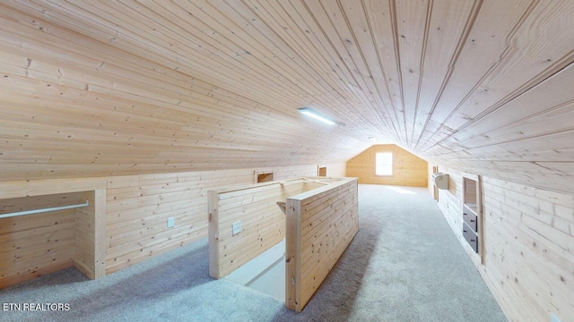 bonus room featuring carpet, wooden walls, wooden ceiling, and vaulted ceiling