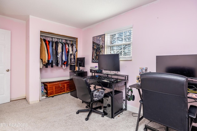 office area featuring light colored carpet