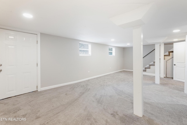 basement with light carpet